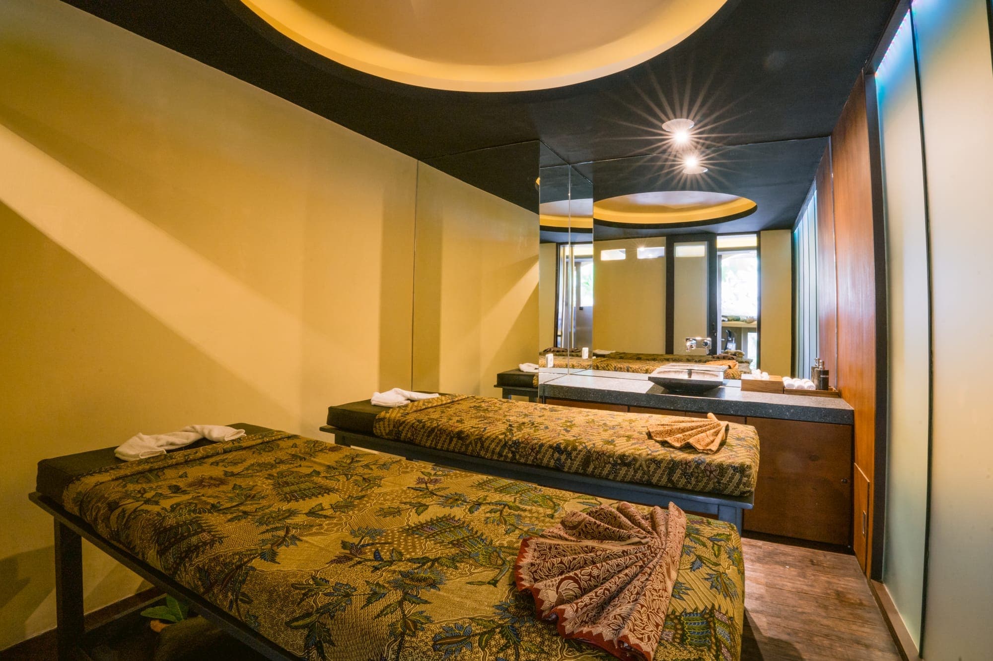 A traditional Balinese massage treatment at Anam Villa