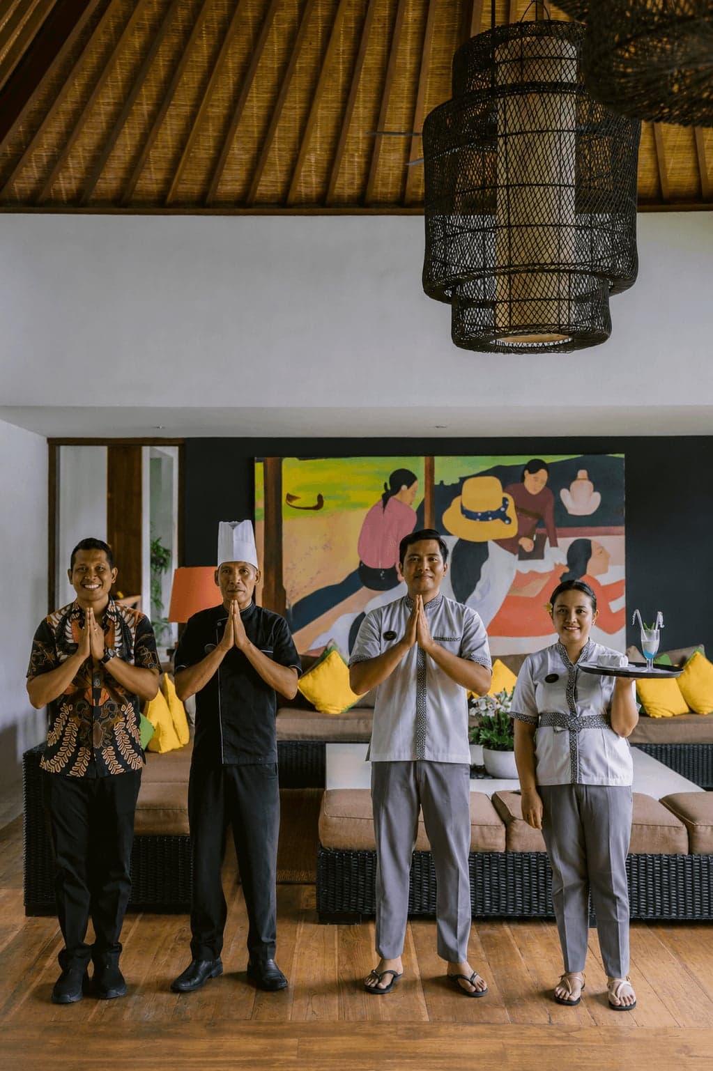 A member of the Anam Villa team preparing the estate for guests